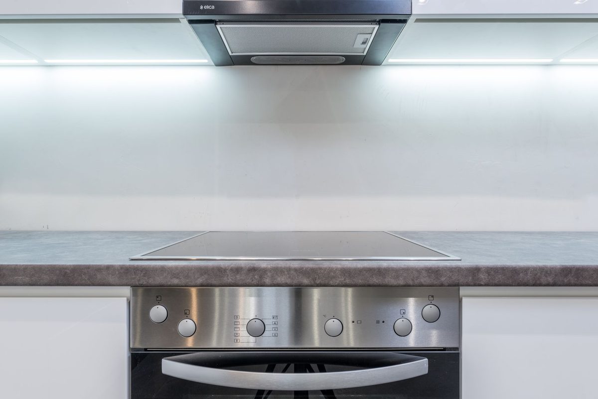 A clean modern kitchen with oven, illustrating the best way to clean an oven