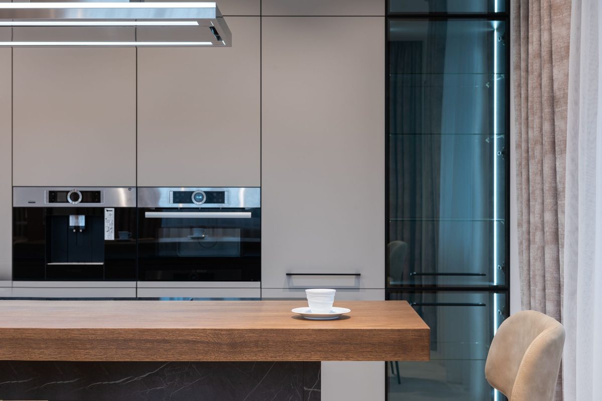 A clean coffee maker and carafe on a counter, relevant to how to clean a coffee maker
